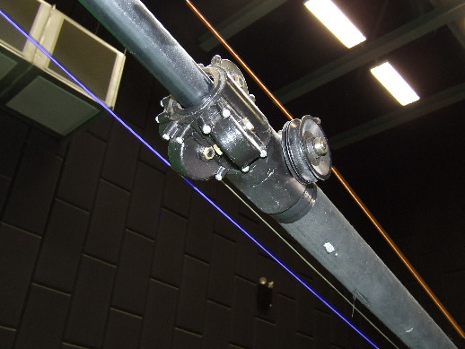 Photo of Fisher boom arm where the telescoping section enters the fixed section of the boom arm